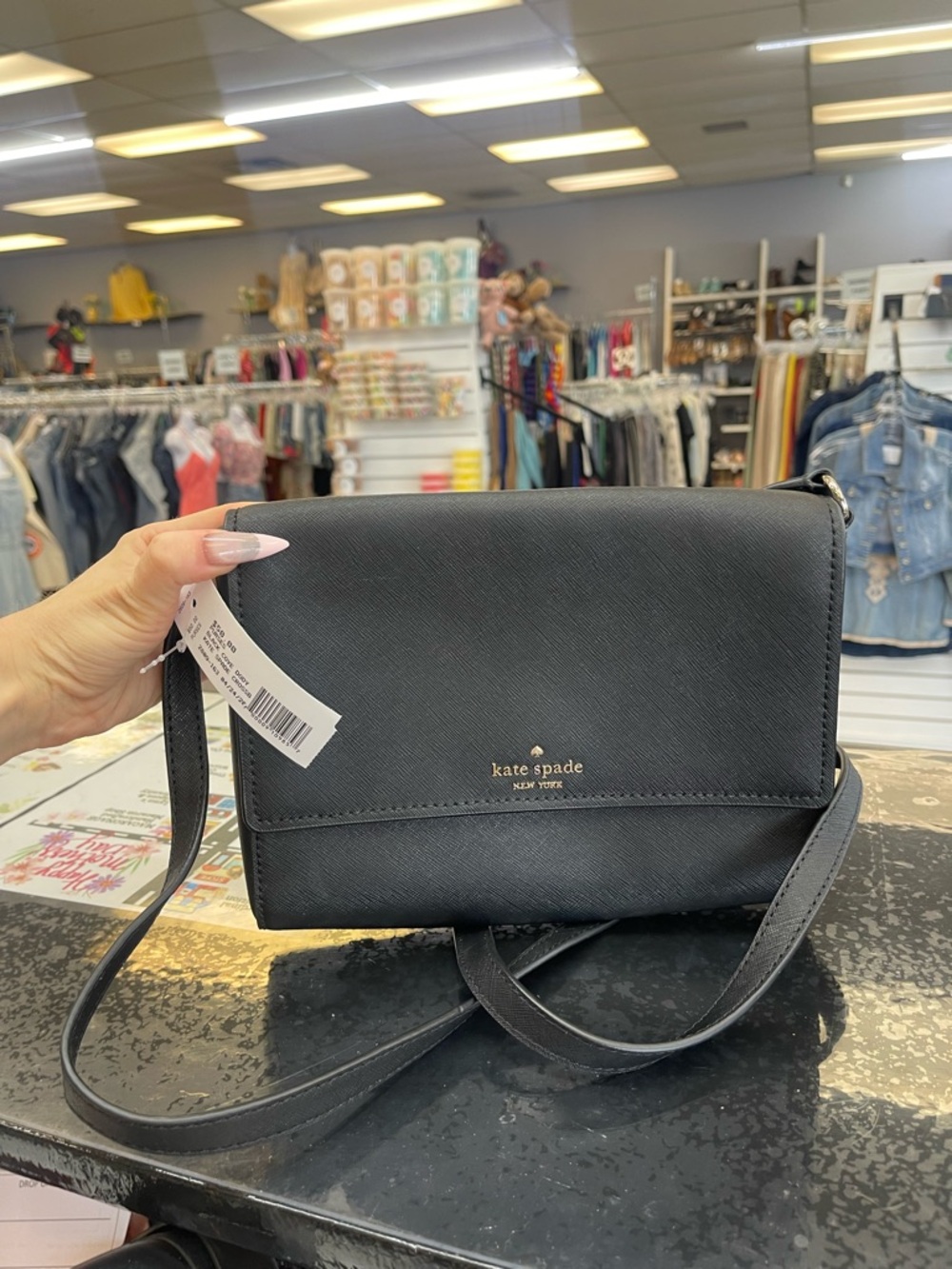 kate spade black saffiano crossbody with gold logo